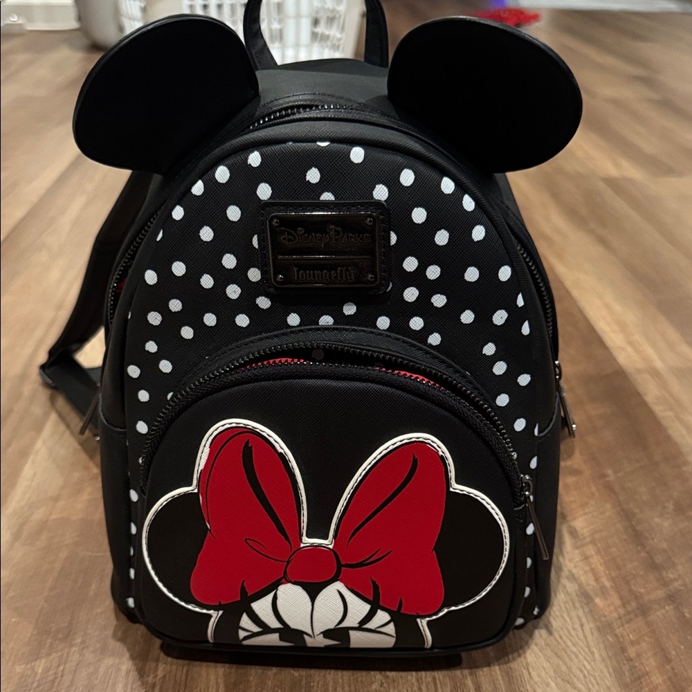 Loungefly Black and White Polka Dot Backpack with Red Bow